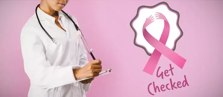 Doctor checking for breast cancer